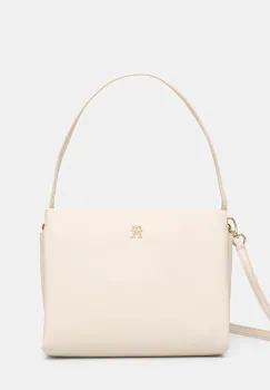 Tommy Hilfiger poseta imagine