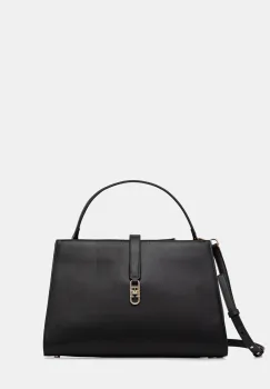 Tommy Hilfiger poseta imagine