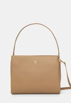 Tommy Hilfiger poseta imagine