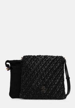 Tommy Hilfiger poseta imagine