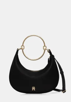 Tommy Hilfiger poseta imagine