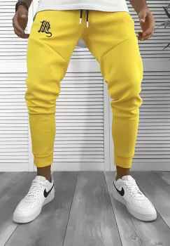 Pantaloni de trening galbeni silon conici 12375 imagine