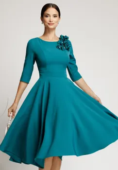 Rochie DY Fashion midi turcoaz din stofa in clos cu floare la bust imagine