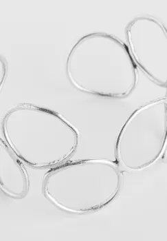 Bratara rigida din cupru argintat cu forme circulare imagine