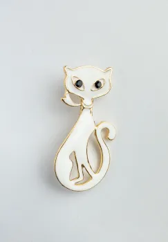 Brosa metalica aurie pisica alba cu ochi negri imagine